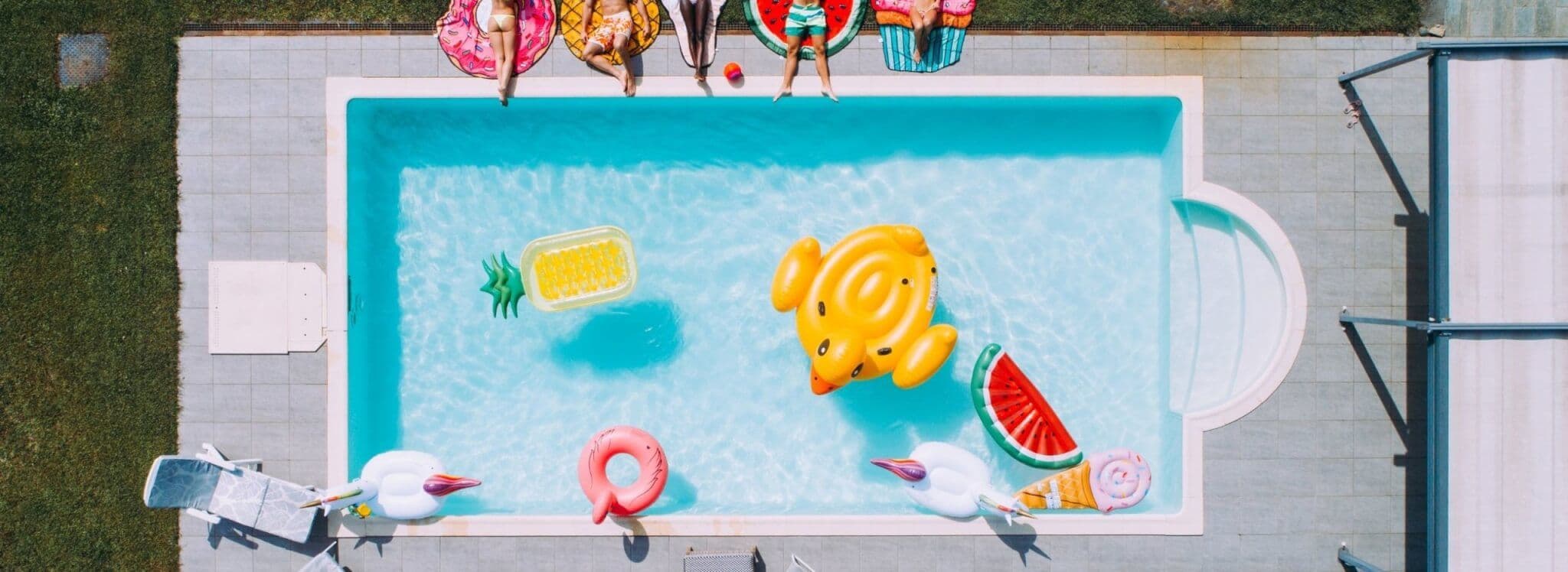 Aerial view of above-ground swimming pool with floats
